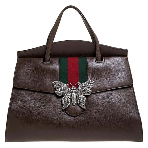 gucci multicolored butterfly bow bag|Gucci bag with butterfly buckle.